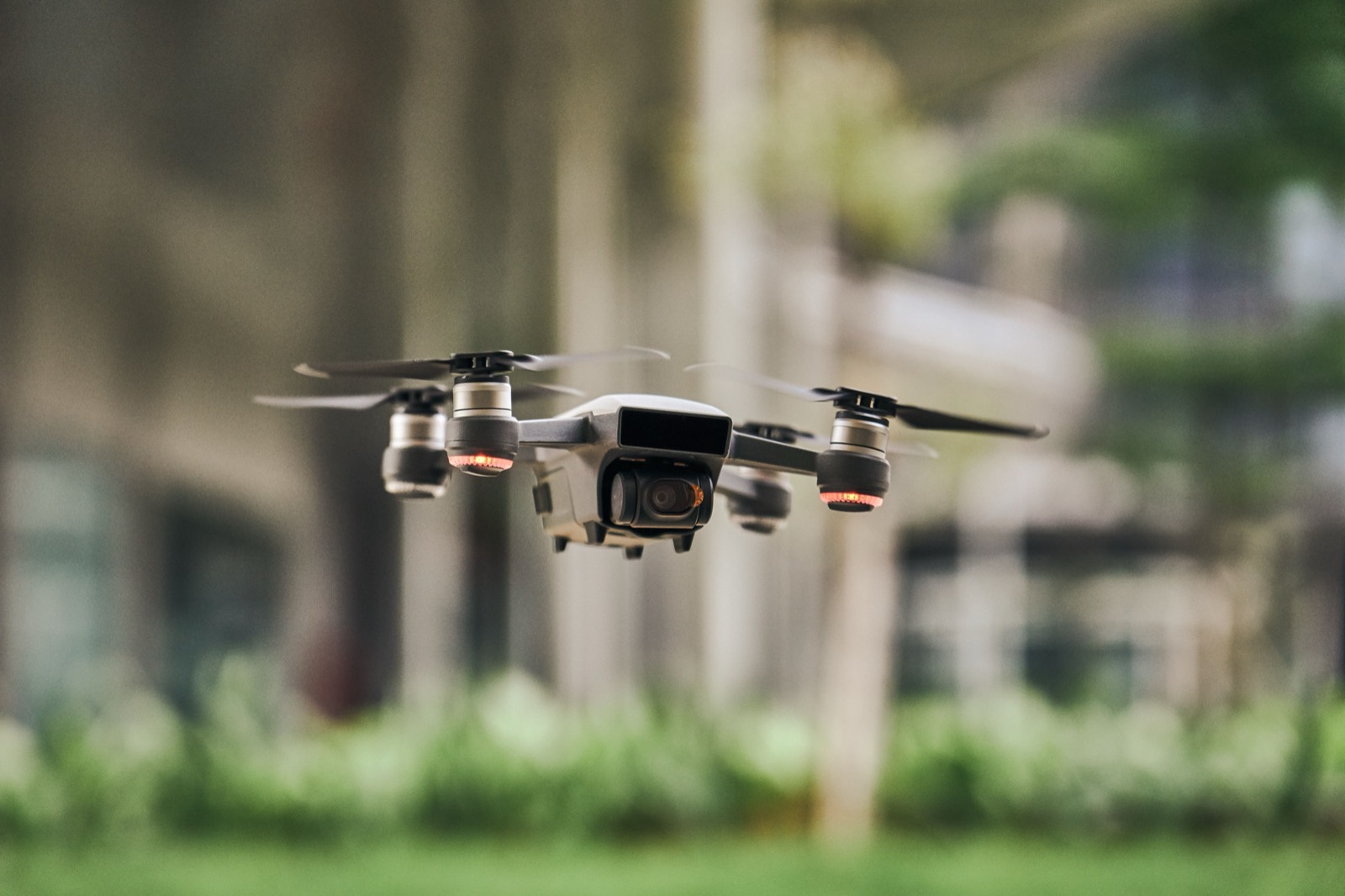 Drone hovering above a city street